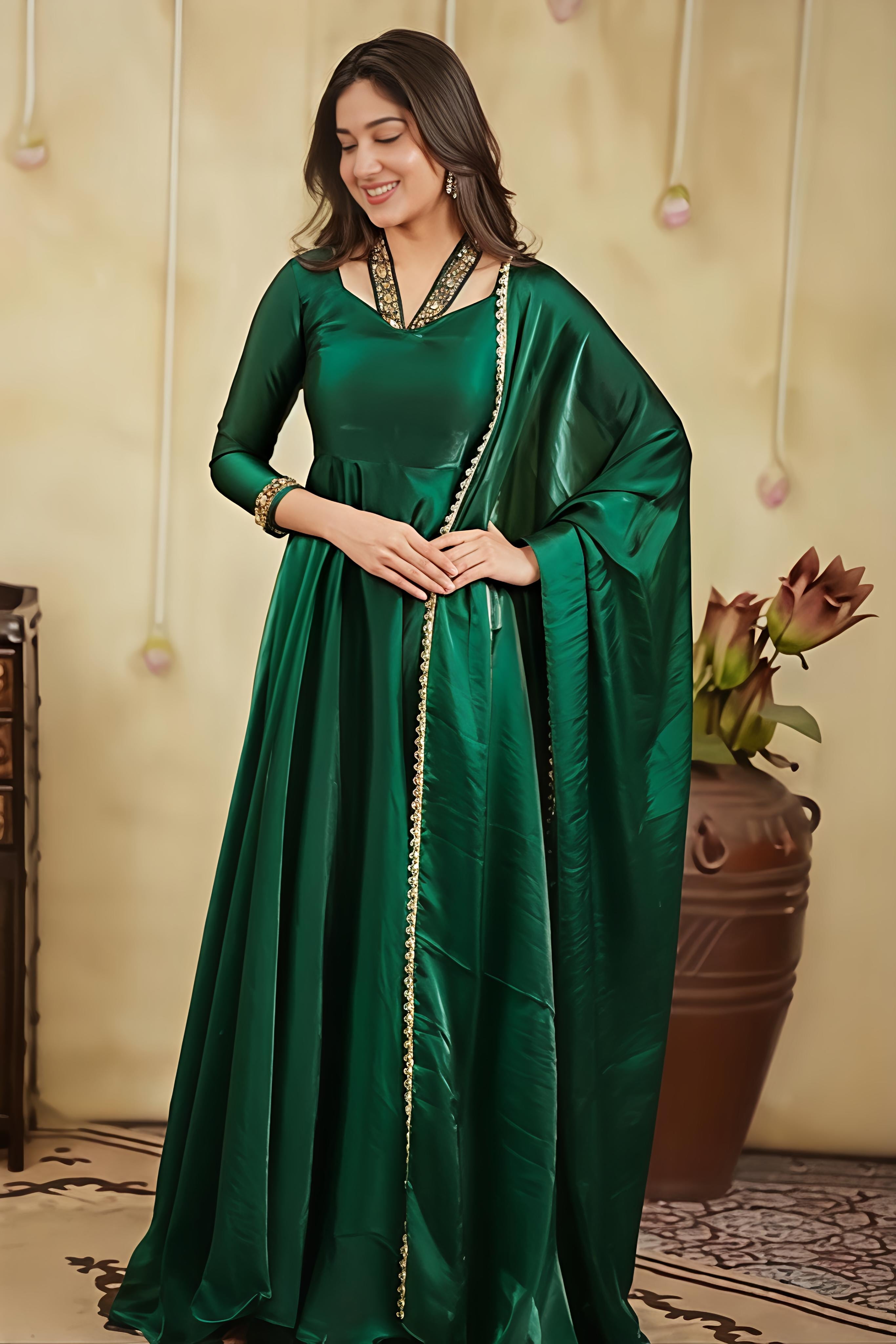 A Graceful Emerald Green Anarkali Crafted In Luxurious Space Silk