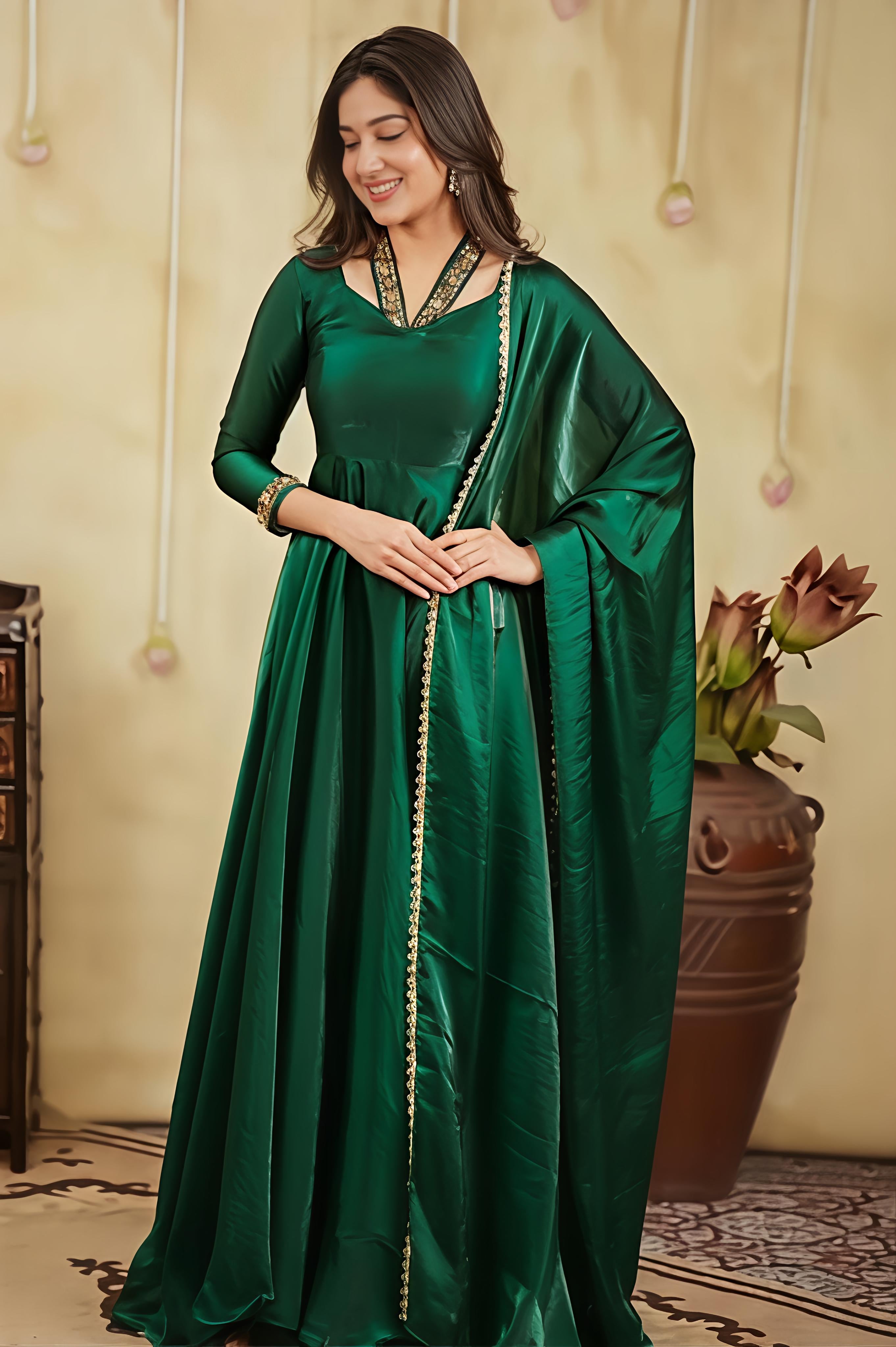 A Graceful Emerald Green Anarkali Crafted In Luxurious Space Silk